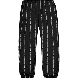 supreme reflective text track pant