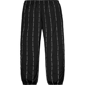 supreme reflective text track pant