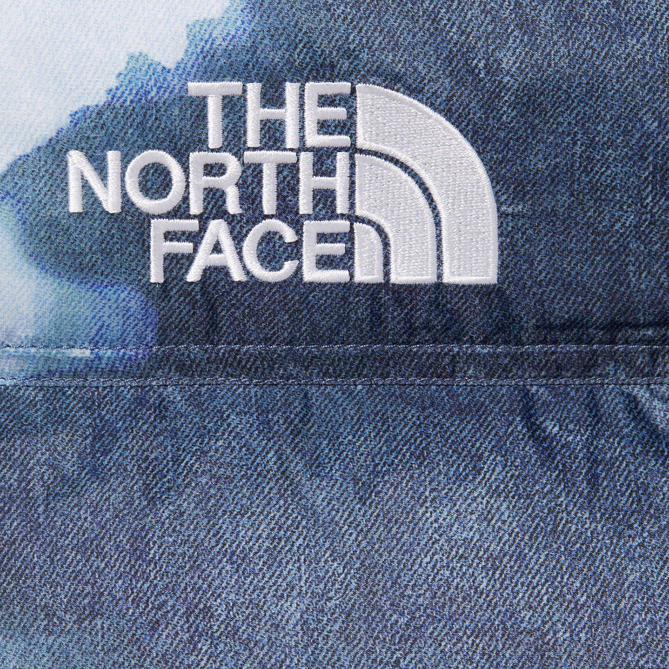 Supreme The North Face Bleached Denim Print Nuptse Jacket Blue