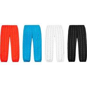 supreme reflective text track pant