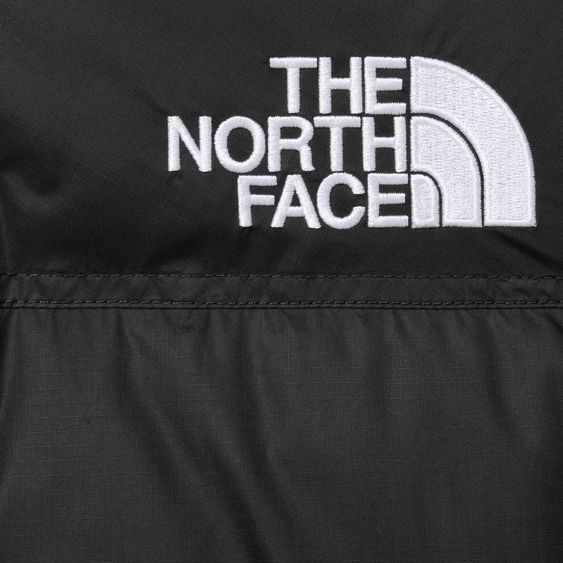 Details on Supreme The North Face Nuptse Jacket Black from fall winter
                                                    2024 (Price is $438)